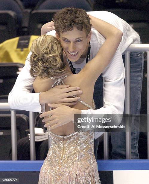 Jennifer Kirk receives a hug after competition Thursday, January 7, 2004 in Short Program at the 2004 State Farm U. S. Figure Skating Championships...