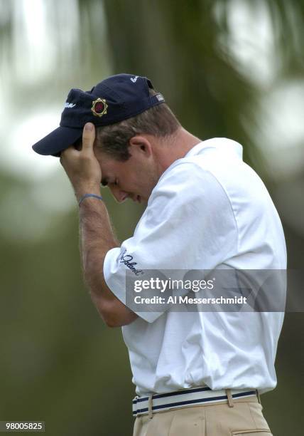 Jonathan Byrd reacts to an errant tee shot on the seventh hole Friday, January 16, 2004 at the Sony Open in Hawaii.