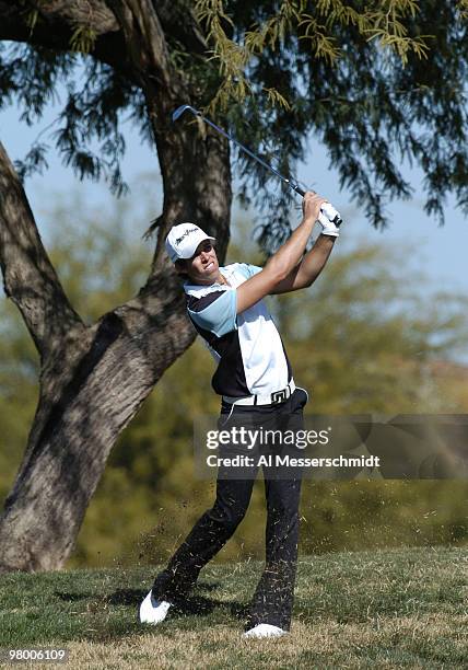 Aaron Baddeley hits from the rough on the second hole during first round competion January 29, 2004 at the 2004 FBR Open at the Tournament Players...