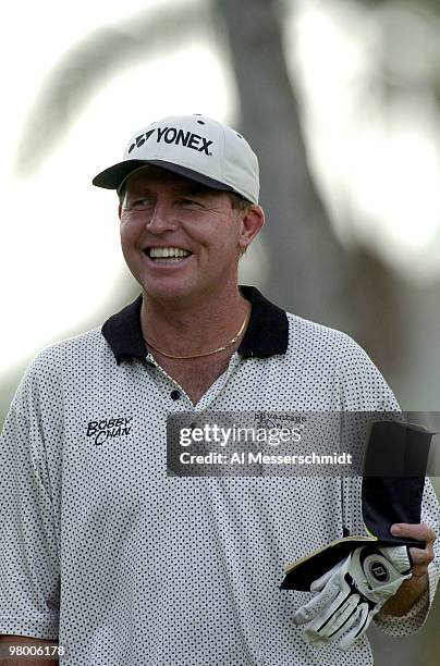 Scott Hoch studies yardage book at Waialae Country Club Friday, January 16, 2004 at the Sony Open in Hawaii.