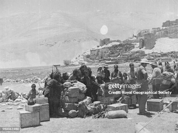 Expedition team and stores at a Tibetan village, Tibet , 30 May 1935. Mount Everest Expedition 1935.