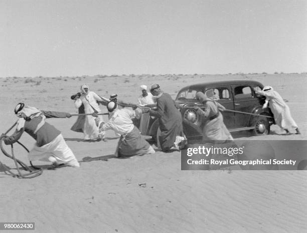 Chevrolet being pulled, Saudi Arabia, March 1937.
