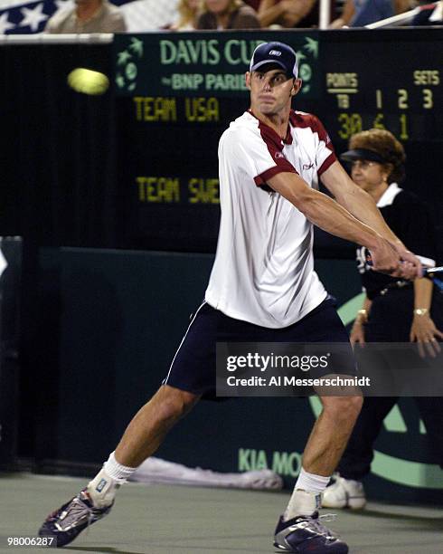 United States' Andy Roddick competes against Sweden's Thomas Enqvist during a Davis Cup quarterfinal match in Delray Beach, Florida April 9, 2004....