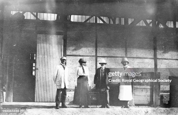 People on the platform at a Baghdad railway station, The woman in this photograph may be Gertrude Bell, Iraq, 1913.