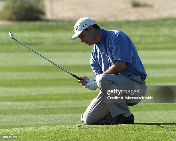 Chris DiMarco reacts to an errant approach shot during second round competition January 30, 2004 at the 2004 FBR Open at the Tournament Players Club...