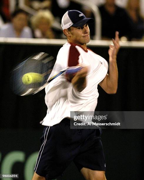 United States' Andy Roddick competes against Sweden's Thomas Enqvist during a Davis Cup quarterfinal match in Delray Beach, Florida April 9, 2004....