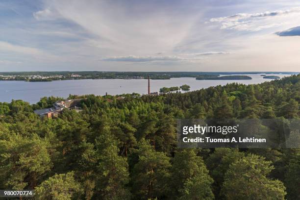 buildings, forest at the pyynikki ridge, lake pyhäjärvi and beyond in tampere, finland, viewed from above on a sunny day in the summer. - above and beyond stock pictures, royalty-free photos & images