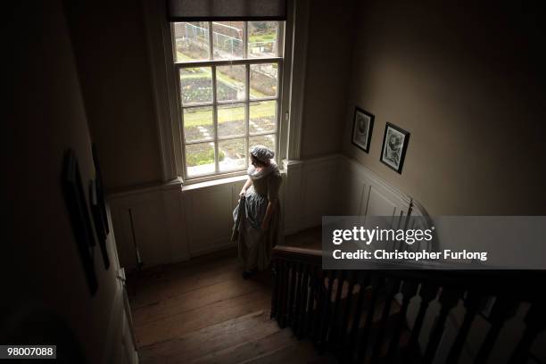 Guide Esther Rutter walks through Wordsworth House, the childhood home of poet William Wordsworth on March 24, 2010 in Cockermouth, England. The...