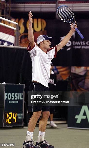 United States' Andy Roddick competes against Sweden's Thomas Enqvist during a Davis Cup quarterfinal match in Delray Beach, Florida April 9, 2004....