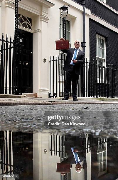 Chancellor of the Exchequer Alistair Darling holds Disraeli's original Budget box outside number 11 Downing Street on March 24, 2010 in London,...
