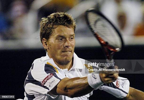 Sweden's Thomas Enqvist competes in the Davis Cup quarterfinals in Delray Beach, Florida April 9, 2004. Enqvist lost to Andy Roddick in three sets.