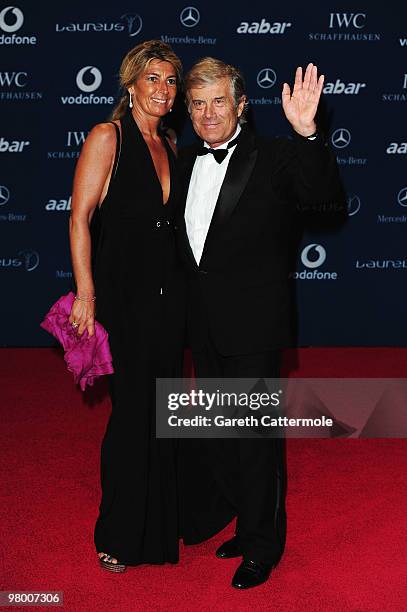 World champion Grand Prix motorcycle road racer Giacomo Agostini and guest arrive at the Laureus World Sports Awards 2010 at Emirates Palace Hotel on...