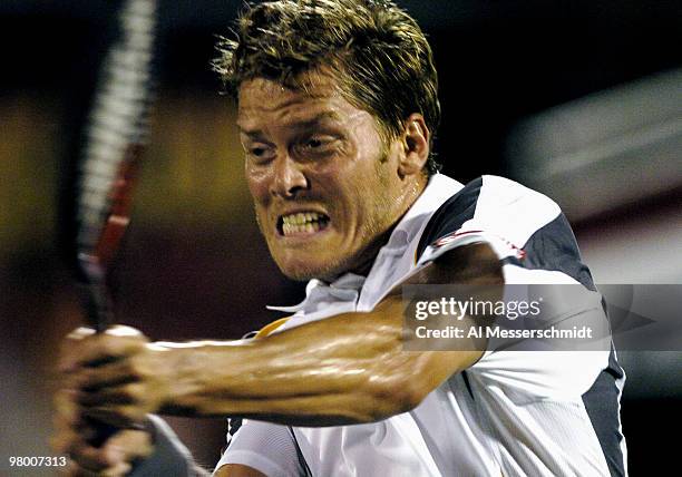 Sweden's Thomas Enqvist competes in the Davis Cup quarterfinals in Delray Beach, Florida April 9, 2004. Enqvist lost to Andy Roddick in three sets.