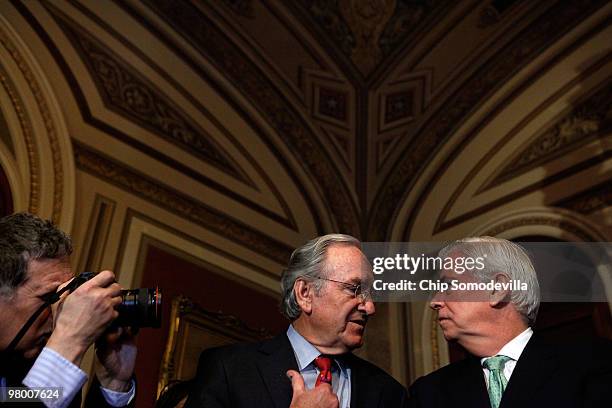 Sen. Tom Harkin and Sen. Christopher Dodd are photographed during a news conference about the benefits for seniors in the new health care reform law...