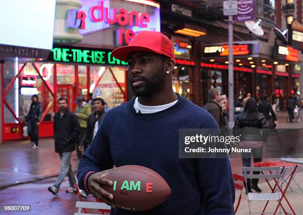 Player Darrelle Revis films an Earth Day E campaign in Times Square on March 23, 2010 in New York City.