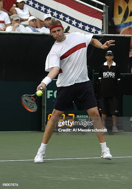 United States' Mardy Fish defeats Thomas Enqvist in the dead rubber match at the Davis Cup quarter finals in Delray Beach, Florida April 11, 2004.