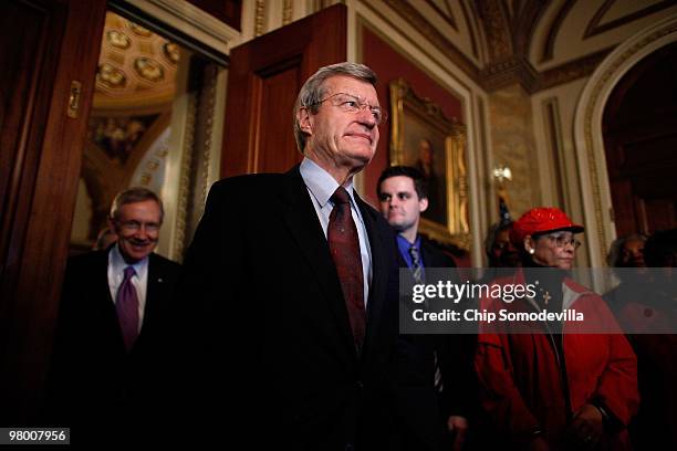 Senate Finance Committe Chairman Max Baucus arrives for a news conference and rally about the benefits for seniors included in the new health care...