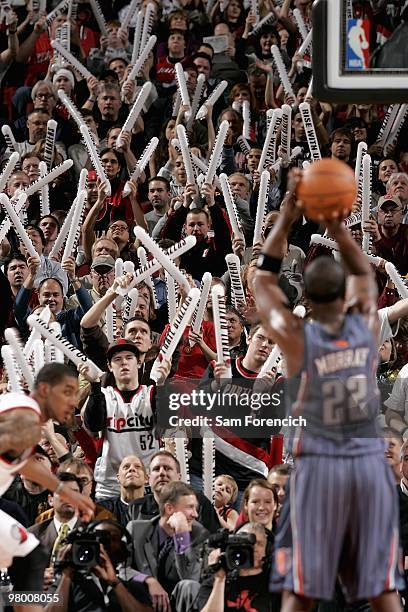 Fans cheer as the Charlotte Bobcats shoot a free throw against the Portland Trail Blazers during the game on February 1, 2010 at the Rose Garden in...