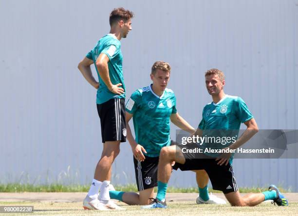 Leon Goretzka, Matthias Ginter and Thomas Mueller of Germany train to the Germany Training session at Park Arena training ground on June 21, 2018 in...