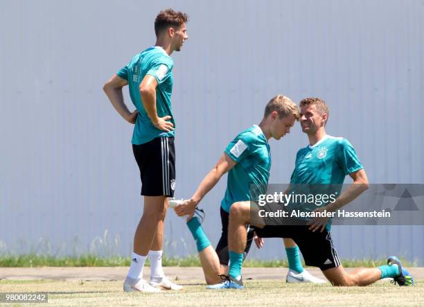Leon Goretzka, Matthias Ginter and Thomas Mueller of Germany train to the Germany Training session at Park Arena training ground on June 21, 2018 in...