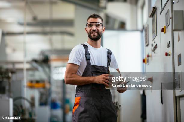 technician in power substation on coffee break - operational technology stock pictures, royalty-free photos & images