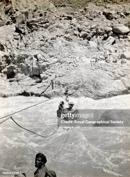 Crossing the Astore river near its confluence with the river Indus, Kashmir, Jammu & Kashmir, 1922.