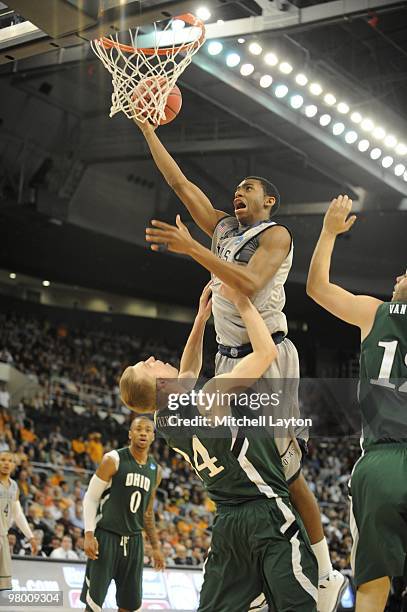 Hollis Thompson of the Georgetwon Hoyas drives to the basket during the first round of NCAA Men's Basketball Championship against the Ohio University...