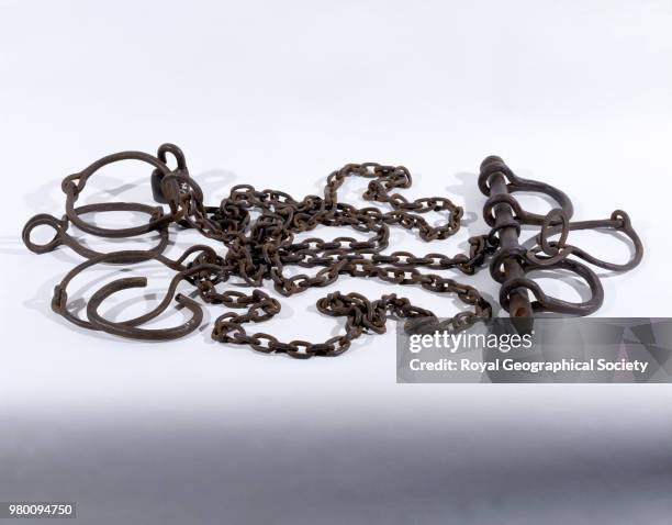 Slave chains brought from Africa by David Livingstone, These consist of four pairs of neck-irons and one pair of leg-irons, which may have brought...