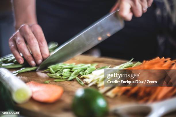 preparing julienned vegetables for korean pancakes close up - kitchen knife 個照片及圖片檔