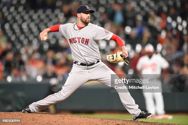 Heath Hembree of the Boston Red Sox pitches during a baseball game against the Baltimore Orioles at Oriole Park at Camden Yards on June 11, 2018 in...