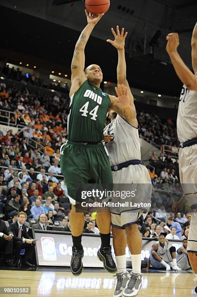 Asown Sayles of the Ohio University Bobcats takes a shot during the first round of NCAA Men's Basketball Championship against the Georgetown Hoyas on...