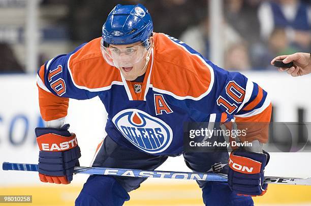 Shawn Horcoff of the Edmonton Oilers gets set to take the face-off during a game against the Vancouver Canucks at Rexall Place on March 23, 2010 in...