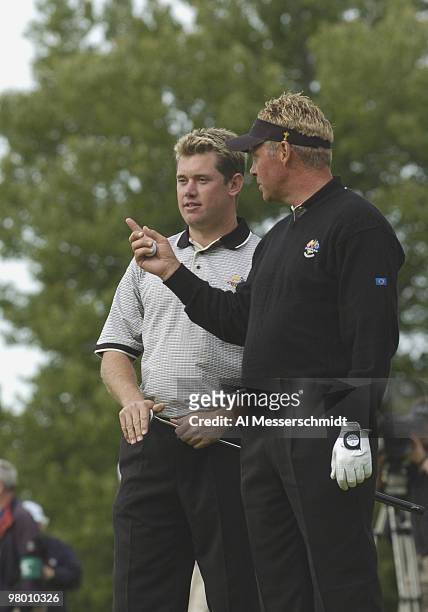 Lee Westwood and Darren Clarke line up a tee shot during the afternoon foursome competition at the 2004 Ryder Cup in Detroit, Michigan, September 17,...