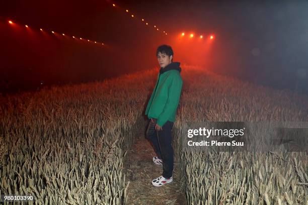 Dongjun Han attends the Ami Alexandre Mattiussi Menswear Spring/Summer 2019 show as part of Paris Fashion Week on June 21, 2018 in Paris, France.