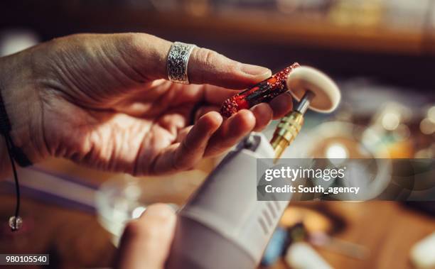 woman making beautiful jewelry - jasper mineral stock pictures, royalty-free photos & images