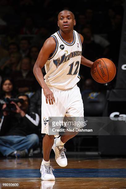 Earl Boykins of the Washington Wizards brings the ball upcourt against the Milwaukee Bucks during the game on March 5, 2010 at the Verizon Center in...