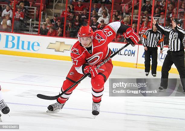 Jerome Samson of the Carolina Hurricanes skates hard on the ice during a NHL game against the Phoenix Coyotes on March 13, 2010 at RBC Center in...