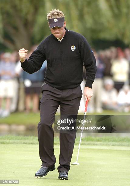 Darren Clarke drops a winning putt during the afternoon foursome competition at the 2004 Ryder Cup in Detroit, Michigan, September 17, 2004.