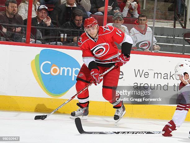 Sergei Samsonov of the Carolina Hurricanes looks to pass the puck during a NHL game against the Phoenix Coyotes on March 13, 2010 at RBC Center in...