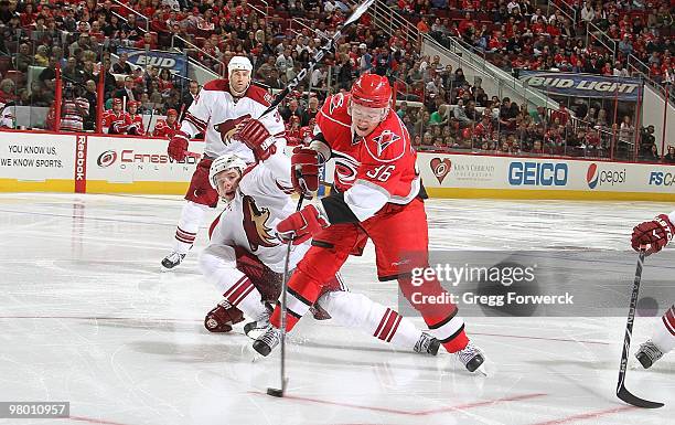 Jussi Jokinen of the Carolina Hurricanes shoots a wrister during a NHL game against the Phoenix Coyotes on March 13, 2010 at RBC Center in Raleigh,...