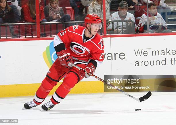 Joni Pitkanen of the Carolina Hurricanes carries the puck during a NHL game against the Phoenix Coyotes on March 13, 2010 at RBC Center in Raleigh,...