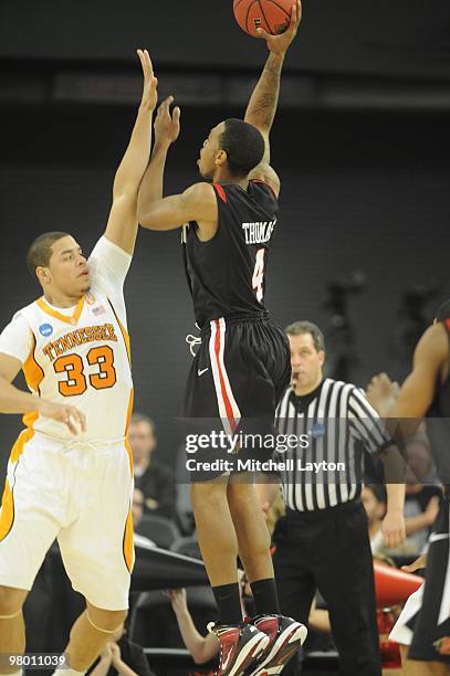 Malcolm Thomas of the San Diego State Aztecs takes a shot during the first round of NCAA Men's Basketball Championship against the Tennessee...