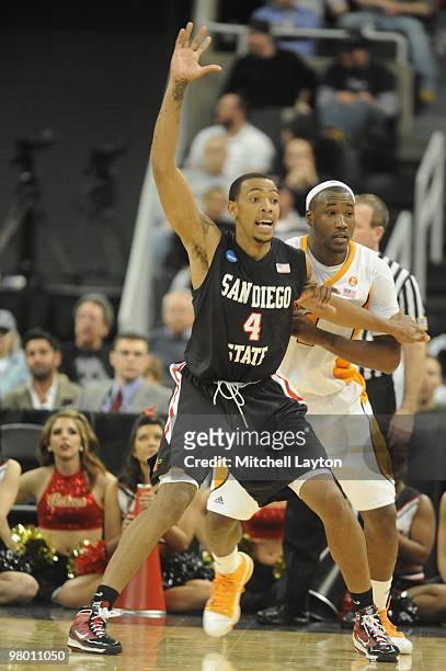 Malcolm Thomas of the San Diego State Aztecs looks for a pass during the first round of NCAA Men's Basketball Championship against the Tennessee...