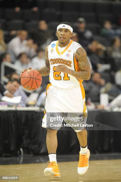 Melvin Goins of the Tennessee Volunteers dribbles up court during the first round of NCAA Men's Basketball Championship against the san Diego State...