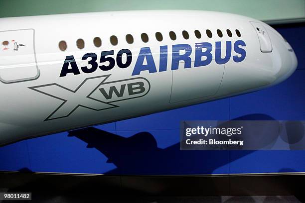 Model of an Airbus A350 jet is displayed at an air travel technology exhibition in Berlin, Germany, on Wednesday, March 24, 2010. A World Trade...