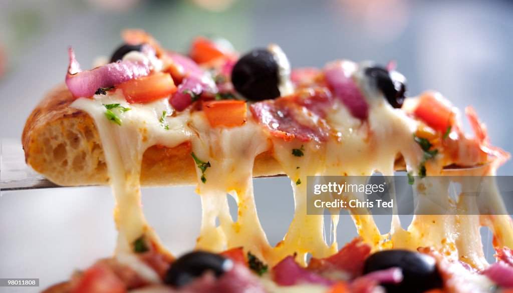 Cheesy Pizza with Olives, Tomato, Pepper & Herbs