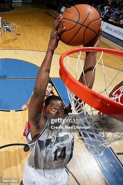 Al Thornton of the Washington Wizards goes for the dunk against the Houston Rockets during the game on March 9, 2010 at the Verizon Center in...