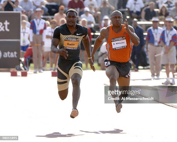 World-record holder Justin Gatlin and Bernard Williams are airborne during a semi-final heat of the 100-meter dash June 23 at the 2006 AT&T Outdoor...