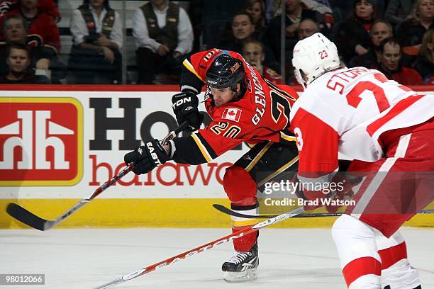 Curtis Glencross of the Calgary Flames shoots the puck against the Detroit Red Wings on March 15, 2010 at Pengrowth Saddledome in Calgary, Alberta,...