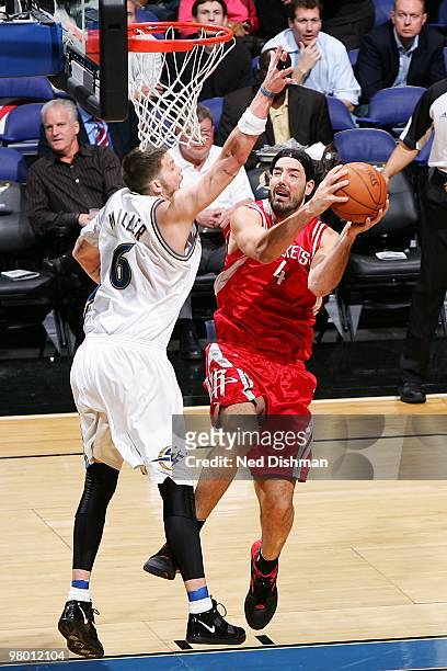 Luis Scola of the Houston Rockets goes to the basket against Mike Miller of the Washington Wizards during the game on March 9, 2010 at the Verizon...